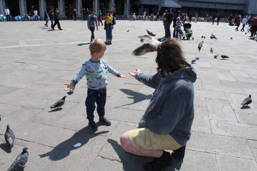 Feeding the pigeons on Saint Mark's square