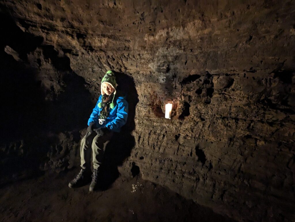 Caves of Hella in Iceland a seat amongst candles